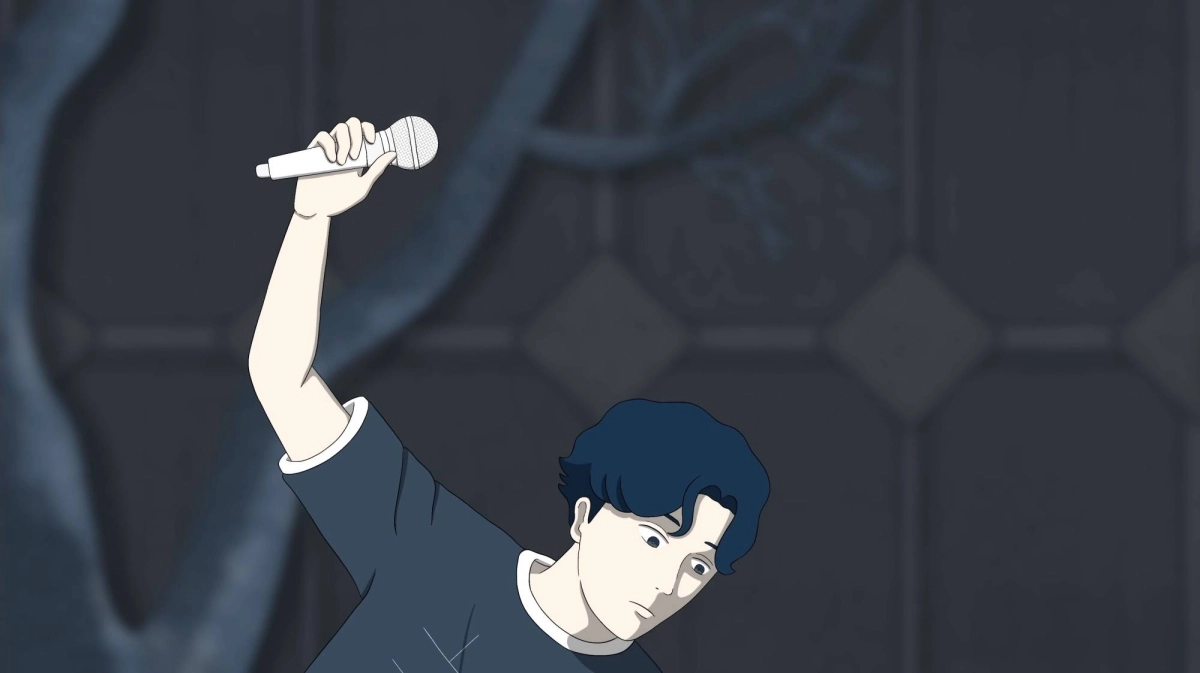 Jinsei with his microphone posed to strike.